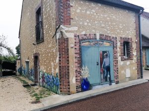 Façade de maison – scène en trompe-l’œil